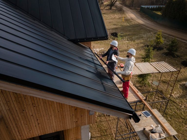 full-shot-roofers-working-with-helmets_23-2149343708